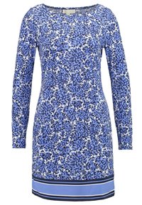 Långärmad klänning med ett blått blommönster på vit bakgrund, med en enfärgad blå fåll accentuerad av marinblå ränder.