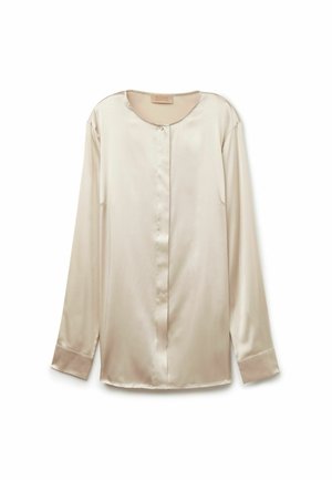 Chemise en satin crème à manches longues avec un col rond, fermeture à boutons sur le devant et poignets étroits. Texture lisse, coupe relaxée.