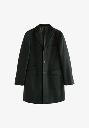 Tume roheline villane mantel tekstureeritud viimistlusega, ühekordne disain, notch-lapid ja pruun sametkaelus. Omab eesmine puusa taskuid ja nupuga kinnitust.