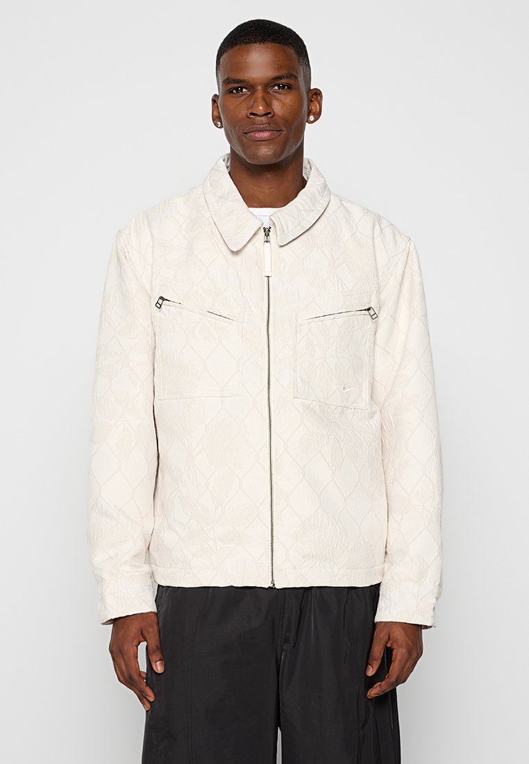 Nike Performance Lichte jas wit Nike Performance Lichte jas wit