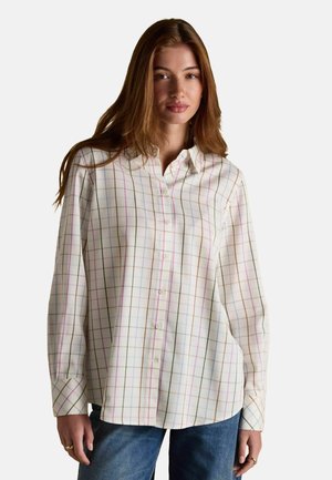White long-sleeve shirt with multicolor grid pattern, button-down front, and pointed collar. Fabric appears lightweight and smooth.