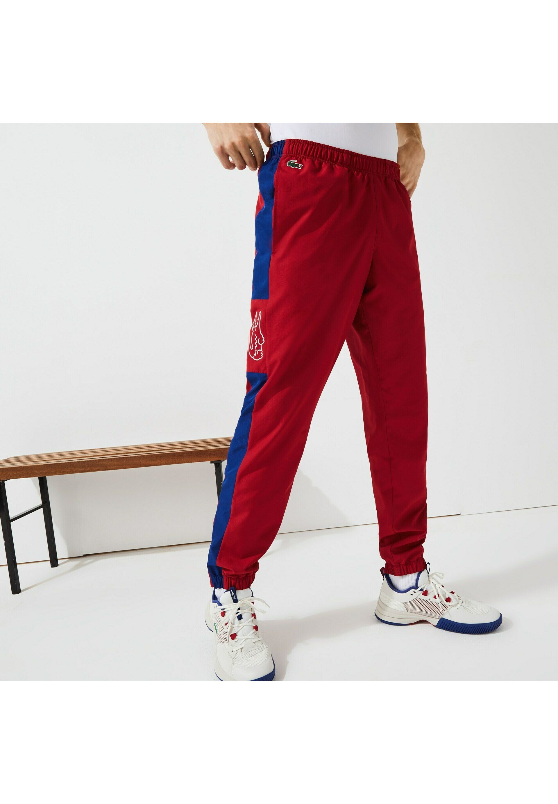 survetement lacoste rouge