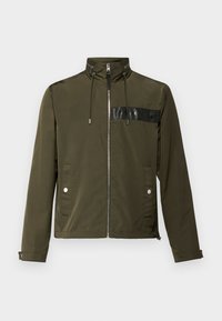 WINDBREAKER - Summer jacket - ivy