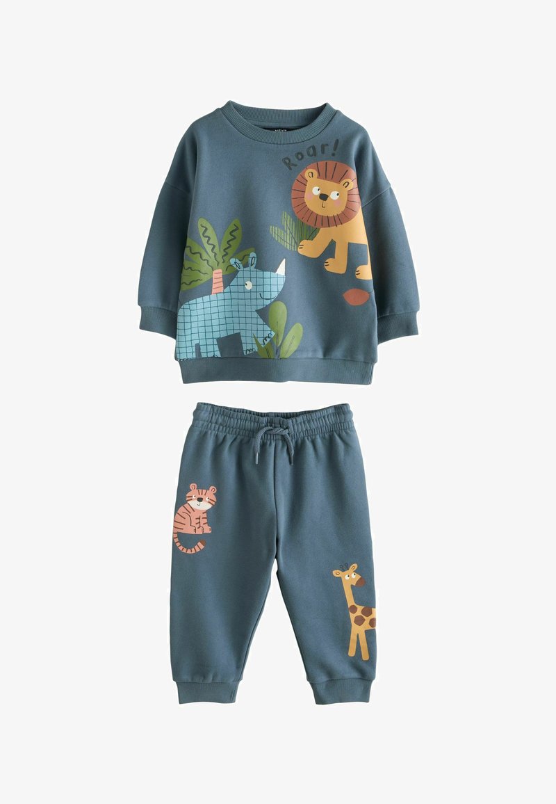 Baumwoll-Zweiteiler mit einem blauen Sweatshirt mit Tiermotiven (Löwe, Nashorn) und passenden Joggingpants mit Akzenten von Tiger und Giraffe.