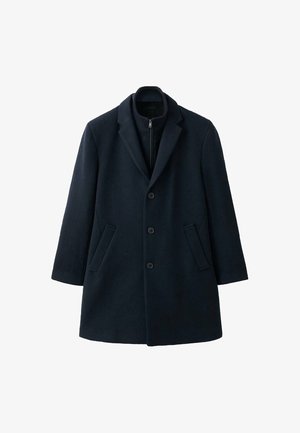 Oceanski volneni plašč z izrezano reverjo, tremi gumbi, dvema stranskima žepoma in zadrgo na notranji podlogi. Gladek tekstura in krojen kroj.