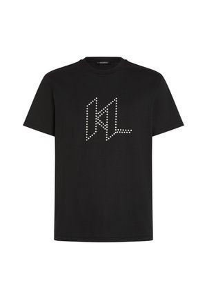 Melna kokvilnas T-kreklu, ar baltu studs KL logotipu priekšpusē. Īsas piedurknes un apaļa kakla izgriezums. Vienkāršs dizains.