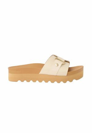 Sandalia beige tipo deslizador con suela gruesa color marrón, correa ancha ajustable con hebilla y suela exterior acanalada para tracción.