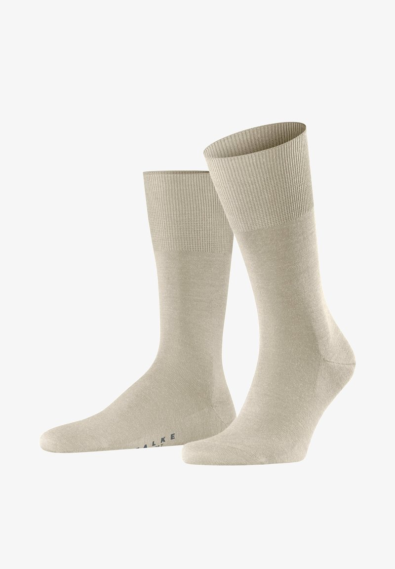 Beige puuvillased sokid ribblikuga, sile tekstuur ning tugevdatud varba ja kanna osad. Omab minimaalset brändimist talla peal.