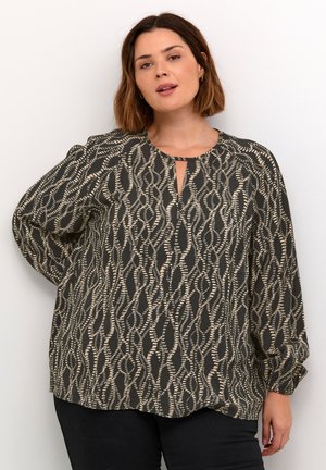Černá a béžová blouse s potiskem, kulatým výstřihem a detaily ve tvaru klíčové dírky, dlouhými rukávy a volným střihem. Texturovaná látka.