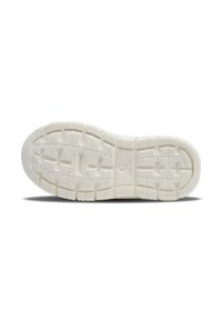 White rubber shoe sole with a textured pattern, featuring circular and rectangular treads for grip. Brand logo embossed on the side.