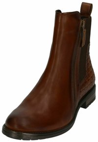 Stivale alla caviglia in pelle marrone con texture liscia, cerniera laterale e motivo trapuntato sul tallone. Tacco basso a blocco e design con punta arrotondata.