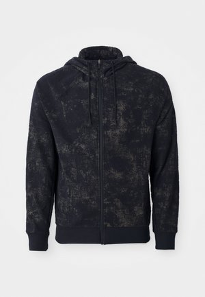 Granatowy hoodie zapinany na zamek z teksturowanym wzorem, z kapturem i sznurkiem, z prążkowanymi mankietami oraz prostym dołem. Wykonany z miękkiego materiału o luźnym kroju.