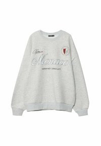 Sudadera gris claro con puños y dobladillo acanalados, que presenta impresiones de "Mónaco" y "Grand Circuit" y un logo de club de carreras en el pecho.