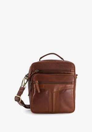 Brown leather crossbody bag featuring multiple zippered pockets, a textured finish, adjustable strap, and a top handle for carrying.