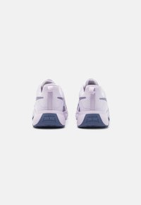 Pair of lilac athletic shoes with mesh material, rounded shape, contrasting navy sole, and pull tab on the heel.