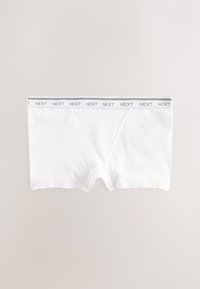 Valkoiset miesten bokserit, joissa on harmaa joustava vyötärönauha, jossa toistuu harmailla kirjaimilla merkki "NEXT".