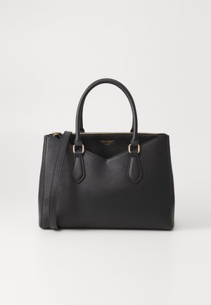 Mustra mustakott, mis on valmistatud tekstureeritud sünteetilisest materjalist, omab kahte käepidet, eemaldatavat õlalinti ja kuldse tooni aksessuaare.