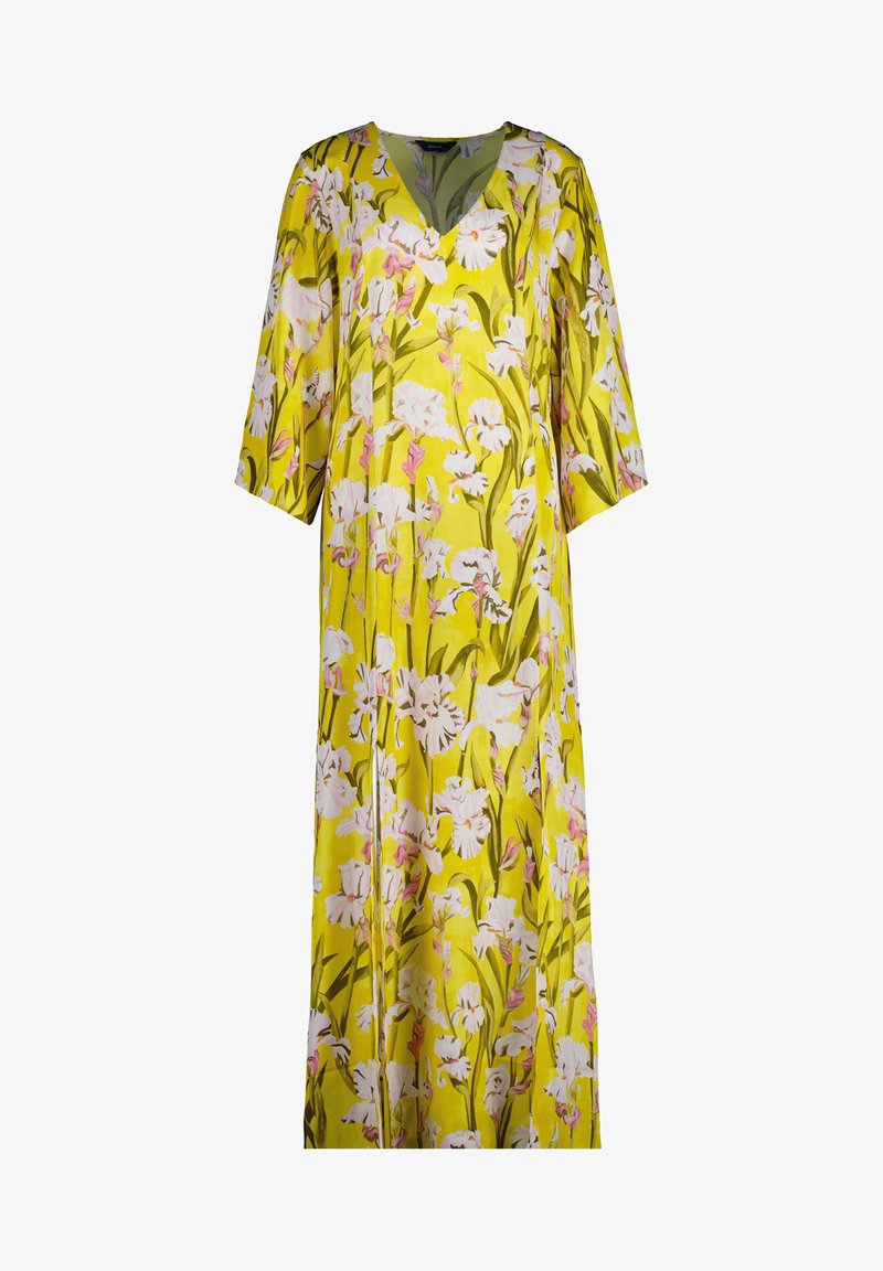 Robe maxi florale en jaune vif avec des motifs floraux blancs et roses, décolleté en V et manches trois-quarts. Texture lisse.