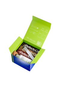 Boîte verte et bleue contenant des produits RefectoCil, y compris des tubes et une bouteille, avec un intérieur à motif montrant des outils d'application et des instructions.