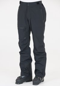 Des pantalons de ski noirs imperméables présentent une coupe décontractée, plusieurs poches zippées et une taille ajustable, fabriqués à partir d'un tissu lisse et résistant.