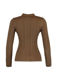 Brun ribbad långärmad topp med hög krage, med en figurnära passform och texturerat mönster genom hela plagget.