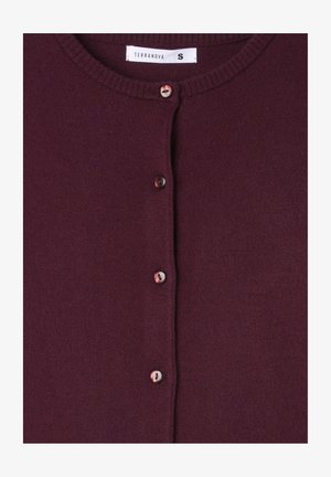 Cardigan bordeaux realizzato in morbido tessuto a maglia, con scollo rotondo e sei bottoni abbinati sul davanti. Etichetta della taglia: S.