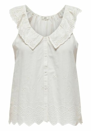 Blusa blanca sin mangas con un gran collar bordado de volantes, botones en la parte frontal y detalles de ojales por toda la prenda, con un dobladillo ondulado.