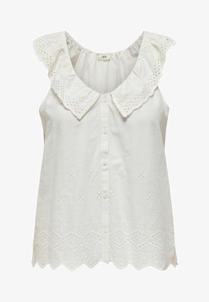 Blusa blanca sin mangas con un gran collar bordado de volantes, botones en la parte frontal y detalles de ojales por toda la prenda, con un dobladillo ondulado.