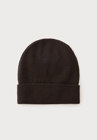 Bonnet en tricot noir avec revers replié, présenté à plat sur un fond clair uni.