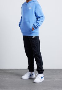 Nike Sportswear CLUB UNISEX - Luvtröja - light blue