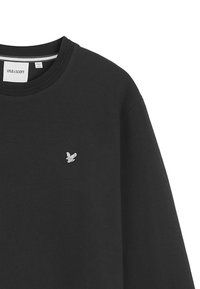 Felpa nera con collo rotondo, caratterizzata da un piccolo logo argentato sul petto. Realizzata in un tessuto testurizzato, presenta maniche lunghe e una vestibilità rilassata.