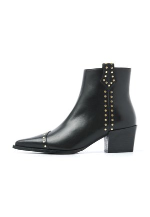 Black leather ankle boot with pointed toe, gold stud accents, and a block heel. Features a decorative tab on the back. Smooth texture.