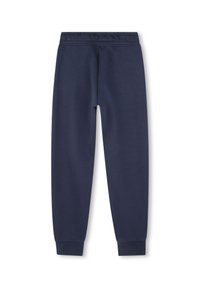 Pantalons de jogging bleu marine en tissu doux, avec une taille élastique et des poignets resserrés pour un ajustement confortable. Texture lisse sans motif.