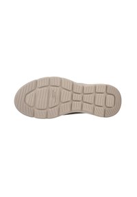 Semelle de chaussure en matériau en caoutchouc texturé, présentant une teinte grise, des motifs striés pour l'adhérence, et une forme lisse et arrondie.