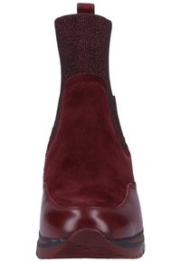 Bottine bordeaux avec bout en cuir, empeigne en daim, tige extensible en tissu pailleté et languette à l'arrière.