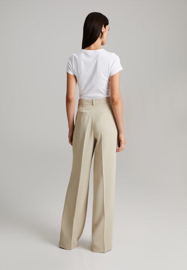 GYTTA - Trousers - champagne2