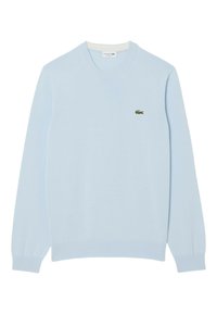 Hellblaues Crewneck-Sweatshirt aus weichem Material, mit einem kleinen grünen Lacoste-Logo. Gerippte Bündchen und Säume sorgen für Textur.