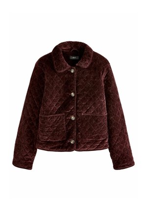 Burgundy quilted jacket in plush fabric with a rounded collar, front buttons, and two patch pockets. Textured surface with diamond pattern.