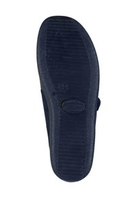 Navy rubber sole with textured grooves and a circular emblem; flat design suitable for casual wear. Outer edge curves slightly.