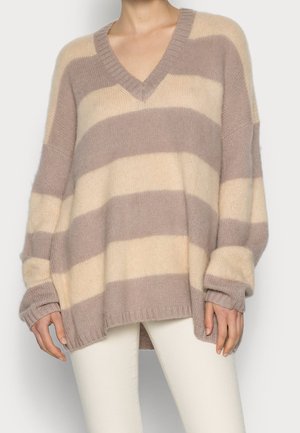 Stickad tröja - beige