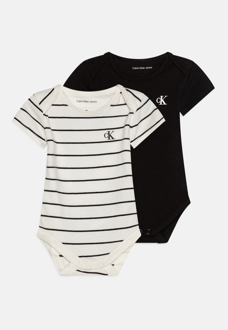 Svarte og hvite babybodyer, en ensfarget svart og en hvit med svarte striper, med en liten "CK"-logo på forsiden. Korte ermer.