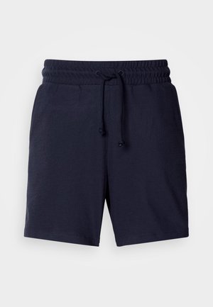 Mørkeblå shorts med avslappet passform, elastisk linning og justerbar snor. Lett materiale med jevn tekstur.