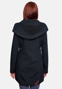 Black hooded jacket with a large collar, textured material, and embroidered "MARIKOO" at the back. Features side seam stitching and leather tag.