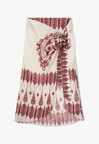 Écharpe en tissu crème avec des motifs floraux et géométriques rouges, présentant un détail de nœud noué sur un côté. Texture douce, design léger.