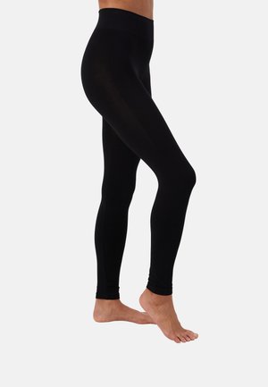 MAGIC Bodyfashion Legingi — zeķes - black