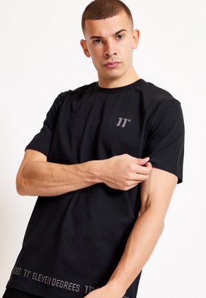 EMBROIDERY HEM - T-shirt print - black