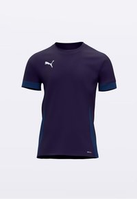 Tengerészkék rövid ujjú sportfelső kék szegélyekkel a mandzsettán és az oldalakon, valamint fehér logóval a bal felső részen. Póló nedvességelvezető anyagból készült.