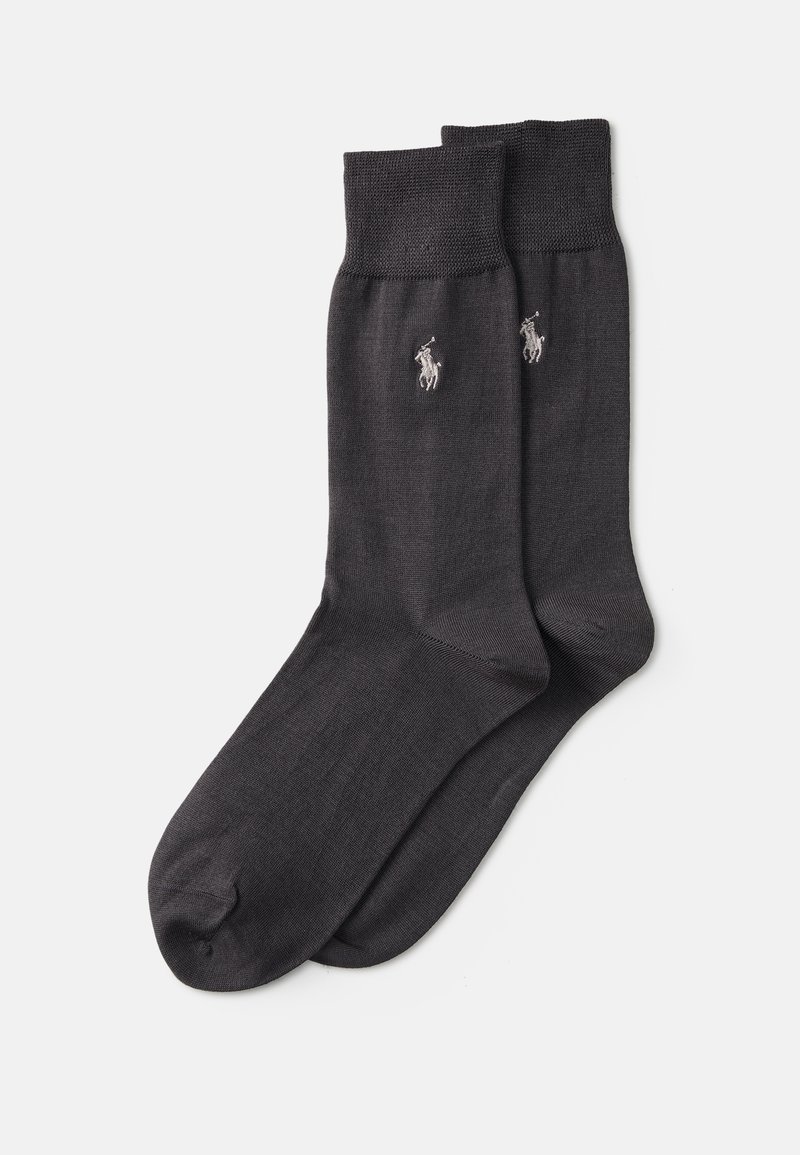 Meias de algodão pretas com uma textura suave, punho canelado e um discreto logótipo bordado em cinza. Comprimento padrão de cano, com calcanhar e bico reforçados.