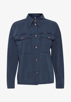 Marineblaues Hemd mit Knöpfen, ausgestatt mit einem kragenlosen Halsausschnitt, zwei Brusttaschen und kupferfarbenen Knöpfen. Hergestellt aus glattem Stoff mit einer lockeren Passform.