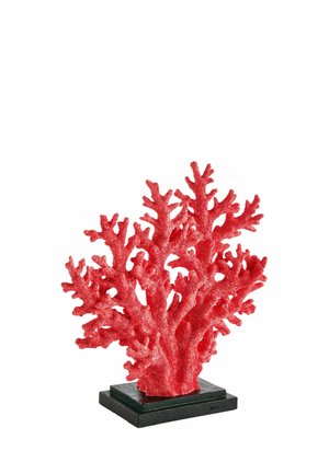 Red coral branch sculpture mounted on a rectangular black base against a white background.